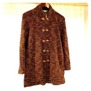 ST John zip sweater jacket with gold details.